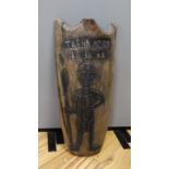 A tribal carved wood shield, inscribed Tasha Andy 16 4 08, 77cm