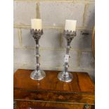 A pair of 17th century style pricket candlesticks, height 48cm