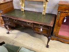 A George II style mahogany breakfront kneehole writing table, width 152cm, depth 67cm, height