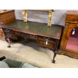 A George II style mahogany breakfront kneehole writing table, width 152cm, depth 67cm, height