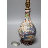 A Chinese clobbered vase, 18th/19th century, with later lamp fitting, and a jade carving of a