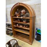 A pair of George III style pine dome topped open bookshelves, width 142cm, depth 26cm, height 216cm