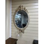 A Victorian style oval girandole wall mirror, width 59cm, height 96cm