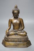 A Himalayan bronze figure of Buddha Shakyamuni, 25cm
