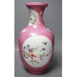 A large Chinese famille rose ruby ground vase, seal mark, 42cm