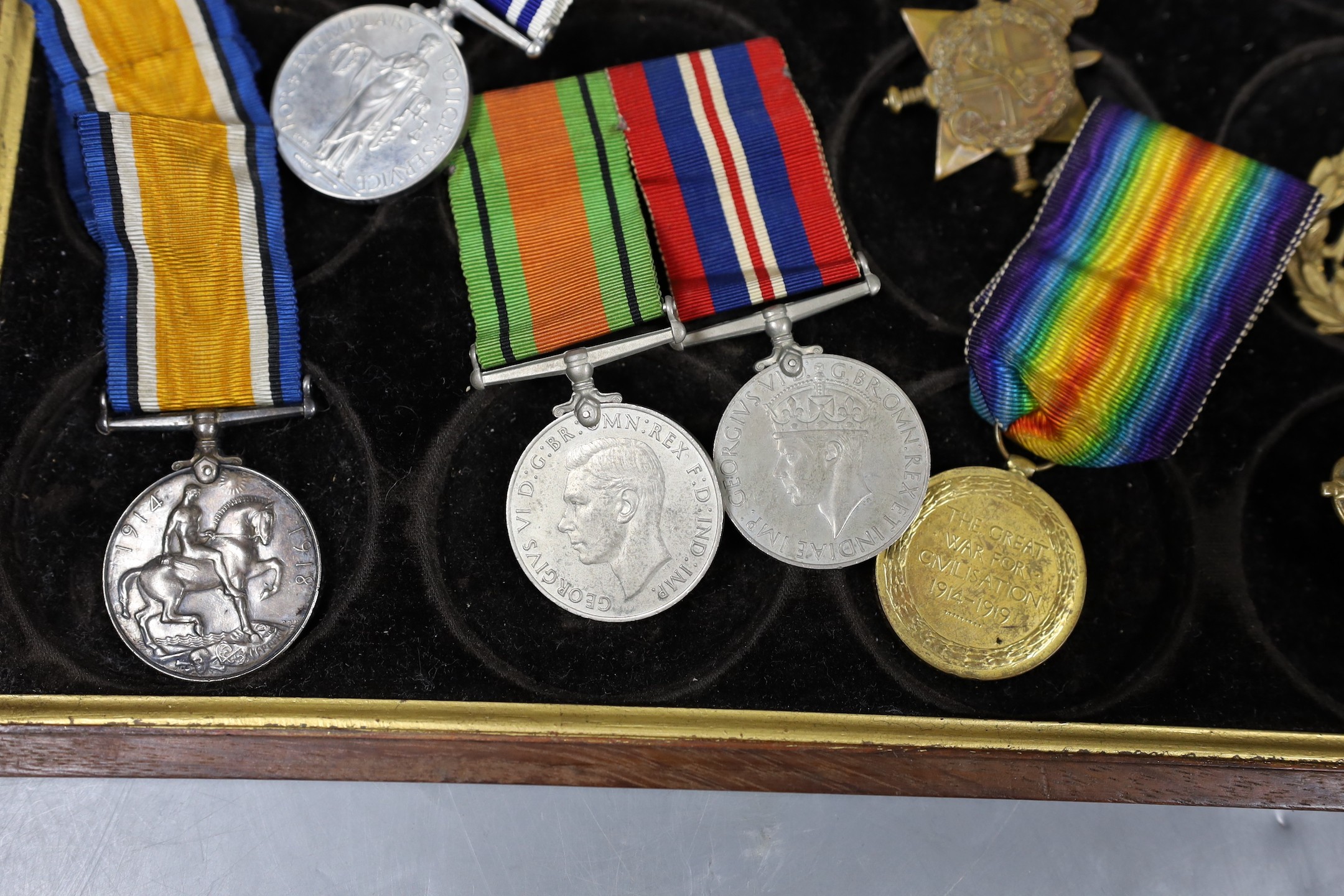 A WWI to Elizabeth II family medal group including WWI trio GSM with Borneo clasp, QEII Police medal - Image 2 of 4