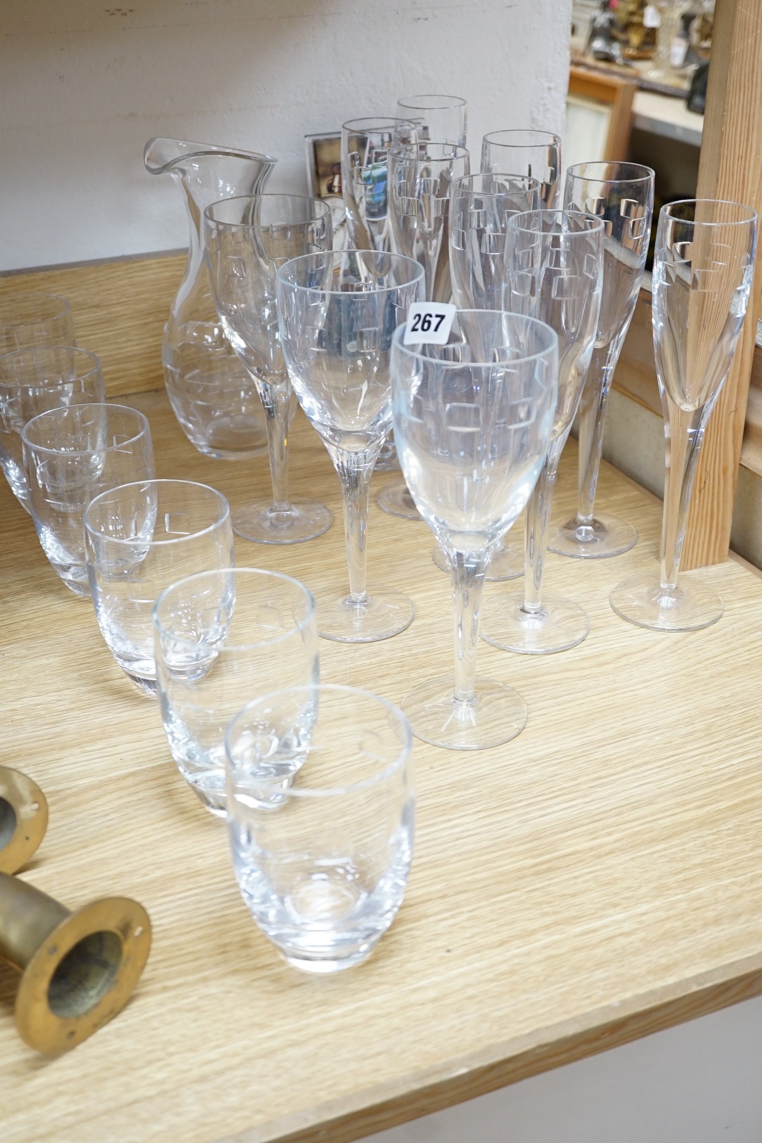 John Rocha for Waterford. A set of 8 cut glass flutes with six matching tumblers, three goblets