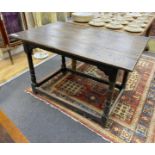 An early 18th century oak rectangular topped side table, width 111cm, depth 68cm, height 74cm