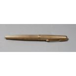 A 1970's engine turned 9ct gold cased Parker fountain pen. 13cm long