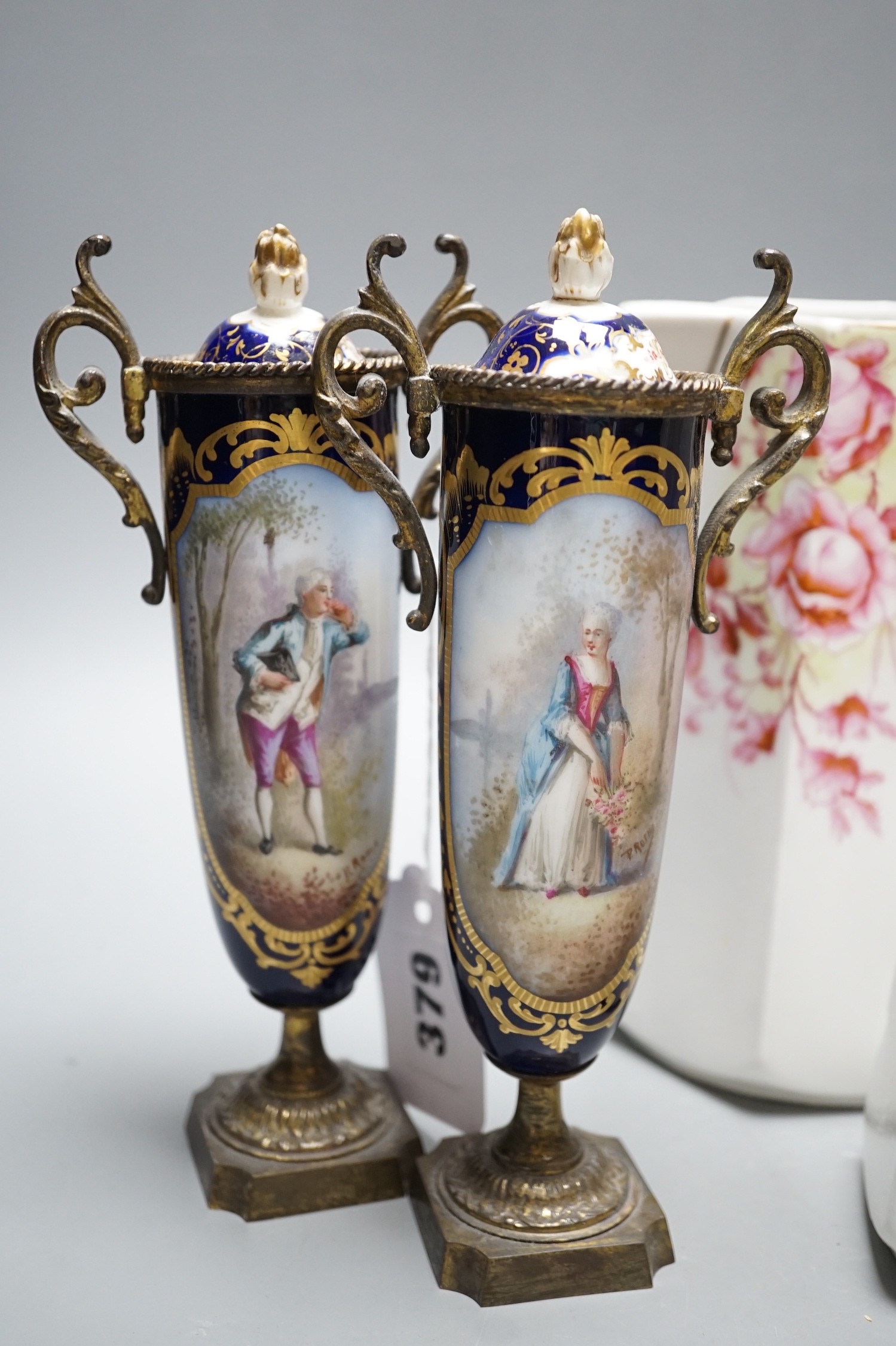 A pair of 19th century French porcelain and gilt metal vases and graded set of three continental - Image 2 of 3