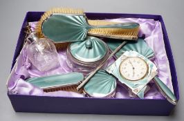 A George V silver and green guilloche enamel set nine piece dressing table set, by Albert Carter,