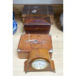 A 19th century mahogany tea caddy, writing slope, leather box and mantel clock, largest 30cm wide