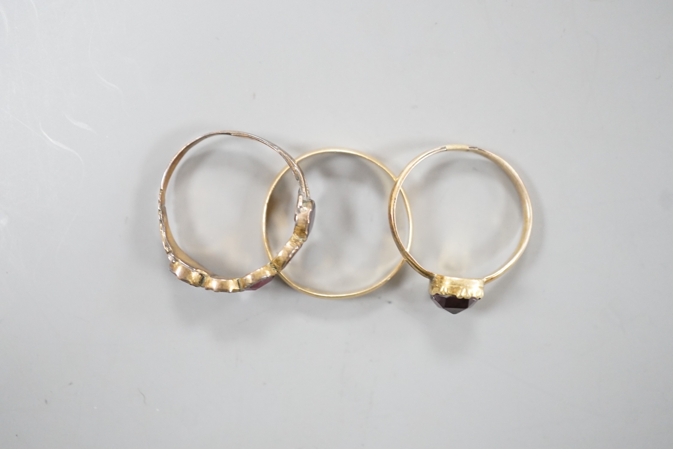 Two 19th century yellow metal and garnet set rings, including five stone half hoop, size J and - Image 3 of 3