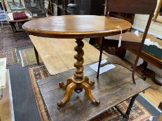 A Victorian Edwards & Roberts oval walnut occasional table on twist stem, width 76cm, depth 44cm,