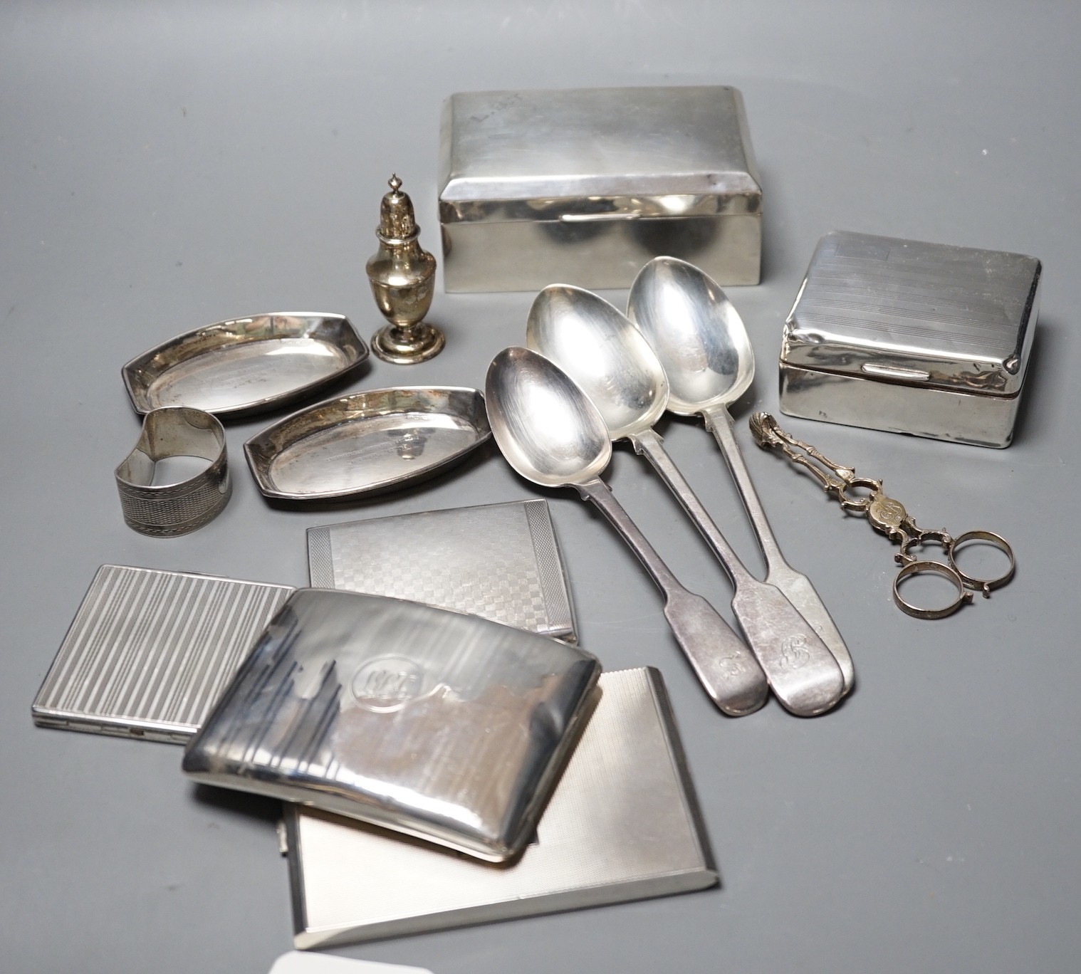 Mixed silver or white metal items including two cigarette boxes, three cigarette cases, cutlery,