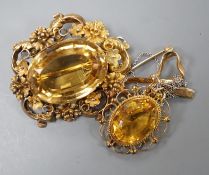 A late Victorian yellow metal and oval cut citrine set brooch, 49mm and a modern 9ct gold and oval