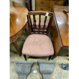 A pair of Sheraton period mahogany dining chairs