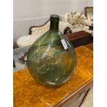 A large green glass carboy, height 60cm