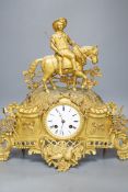 A Louis XV style gilt metal cased eight day mantel clock, 37cm tall