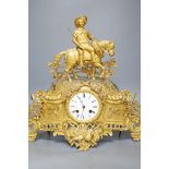 A Louis XV style gilt metal cased eight day mantel clock, 37cm tall