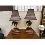 A pair of Thomas Blakemore elephant and book stack tablelamps and shades, height including shades