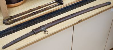 A Japanese Type 94 military sword lacking tsuba and hilt. Signed tang. 90cm excl scabbard