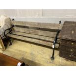 A Victorian painted cast iron slatted garden bench, length 180cm, depth 56cm, height 82cm