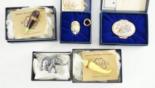 Two Halcyon Days enamel boxes; frog and 1991, two Dubarry boxes and a white metal model elephant,