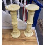 A pair of alabaster pedestals, height 78cm