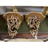 A pair of 19th century carved giltwood roccoco wall brackets, width 46cm, depth 30cm, height 44cm