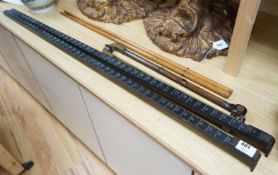 A pair of Bentley & Taylor rail measures together with other tools, longest 120cm