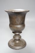 A bronzed cast iron urn, 22cm