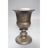 A bronzed cast iron urn, 22cm