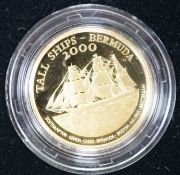 A cased Tall Ships Bermuda 2000 Race of the Century Commemorative gold proof $15 coin, with