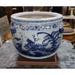 A large Chinese blue and white fish bowl. 39cm high