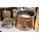 An 18th century French copper cauldron and two others