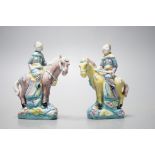 A pair of early 20th century Chinese equestrian groups, 9cm tall