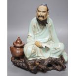 A Chinese Shiwan pottery figure