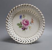 A late 19th century Meissen circular basket border dish with flower decoration, 26cm diameter