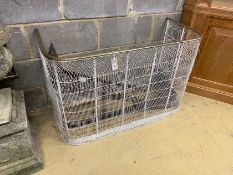 A 19th century brass tipped white painted wire mesh fire guard, width 100cm, depth 45cm, height