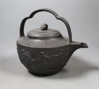 An unusually large Wedgwood black basalt teapot and associated cover, c.1800, 25cm