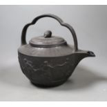 An unusually large Wedgwood black basalt teapot and associated cover, c.1800, 25cm