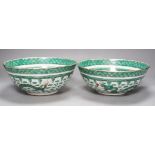 A pair of Chinese green enamelled ‘dragon’ bowls, 20th century, 23cm diameter