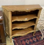 A reproduction Italian walnut serpentine open bookcase, length 98cm, depth 32cm, height 95cm