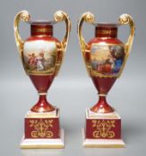 A pair of Vienna style painted porcelain vases, early 20th century 25cm