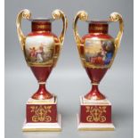 A pair of Vienna style painted porcelain vases, early 20th century 25cm