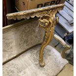A Victorian giltwood and composition console table, with later faux onyx top, width 62cms, depth