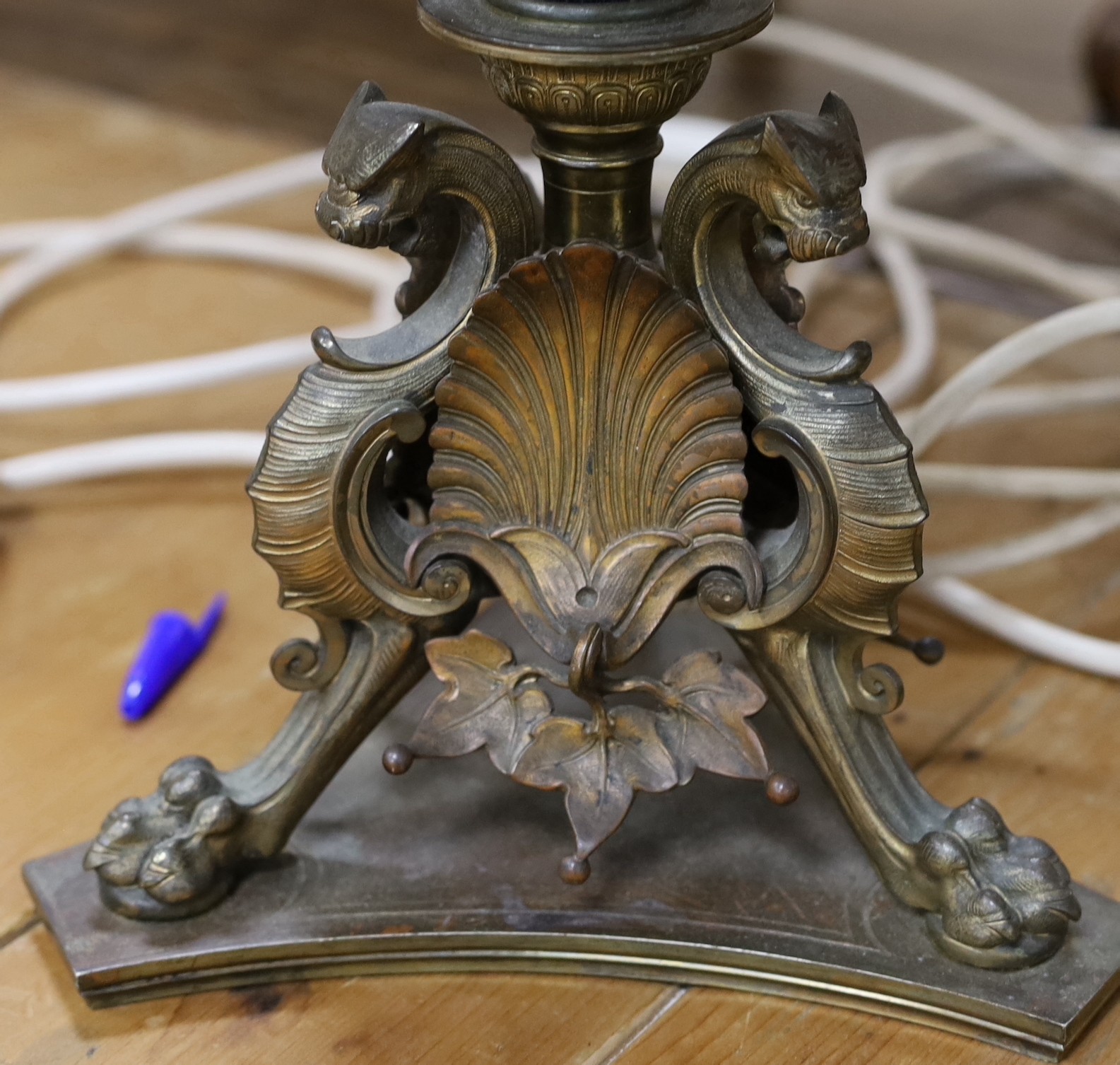 A pair of bronze table lamps, the bases cast with griffins and anthemion - Image 2 of 2