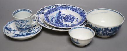 A Worcester teabowl, coffee cup and saucer painted with the Cannonball pattern, a rare napkin