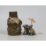 A cold painted spelter pug group and a heavy bronze abstract candlestick. Tallest 9cm